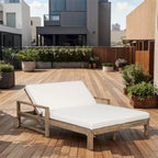 Lit de jour d'extérieur en bois monobloc avec coussins en tissu