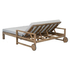 Lit de jour d'extérieur en bois monobloc avec coussins en tissu