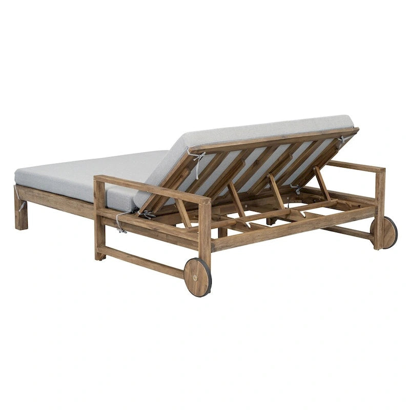 Lit de jour d'extérieur en bois monobloc avec coussins en tissu