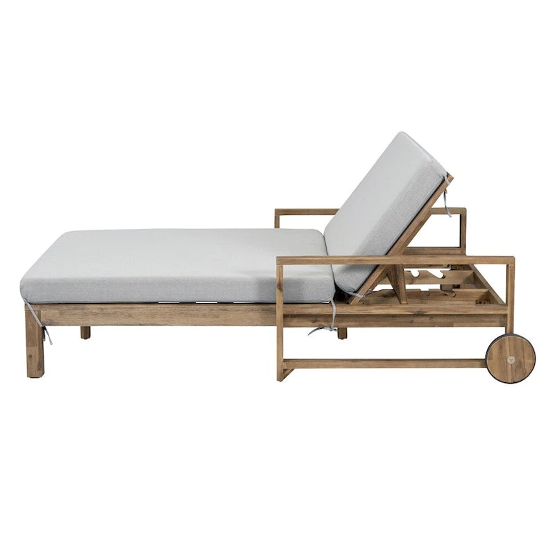 Lit de jour d'extérieur en bois monobloc avec coussins en tissu